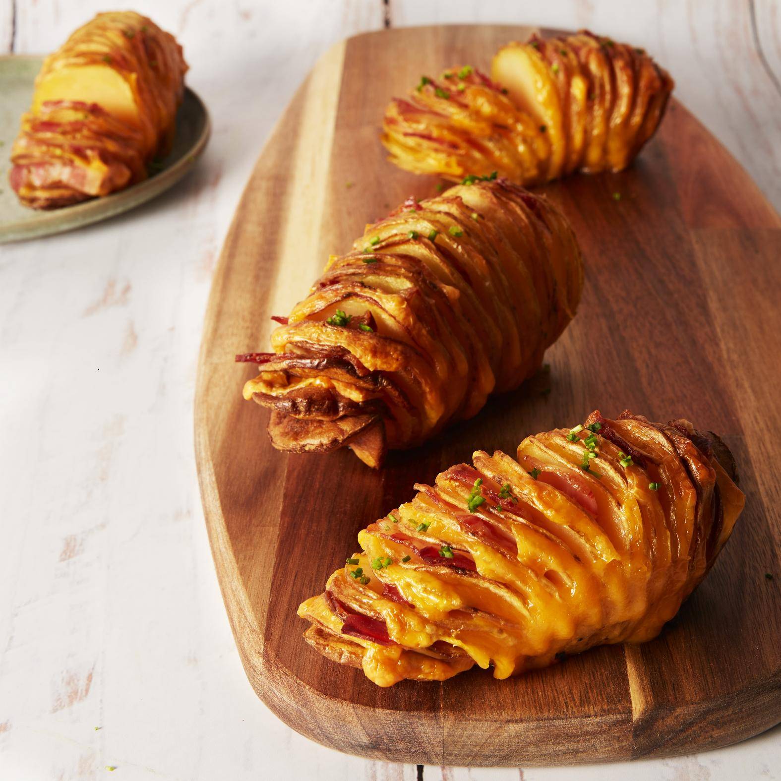 Pommes de terre hasselback farcies au lard et cheddar - Recette Easy Fry Max | Moulinex