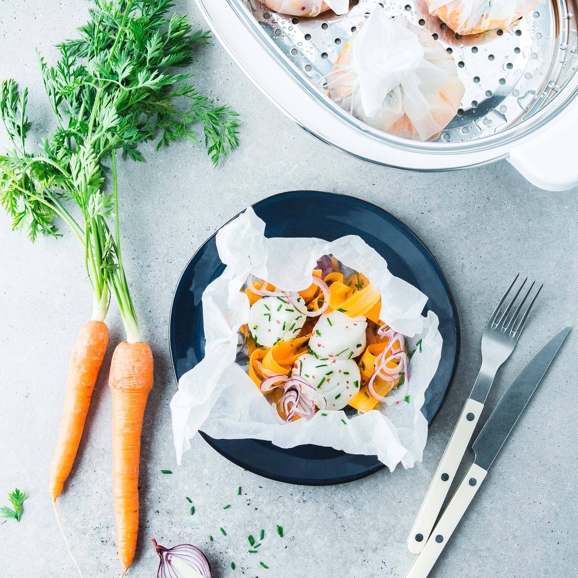 Papillotes de Saint-Jacques, carottes et oignons rouges - Recette Companion | Moulinex